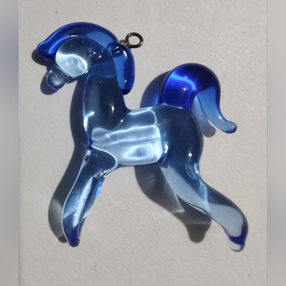 Blue glass horse pendant